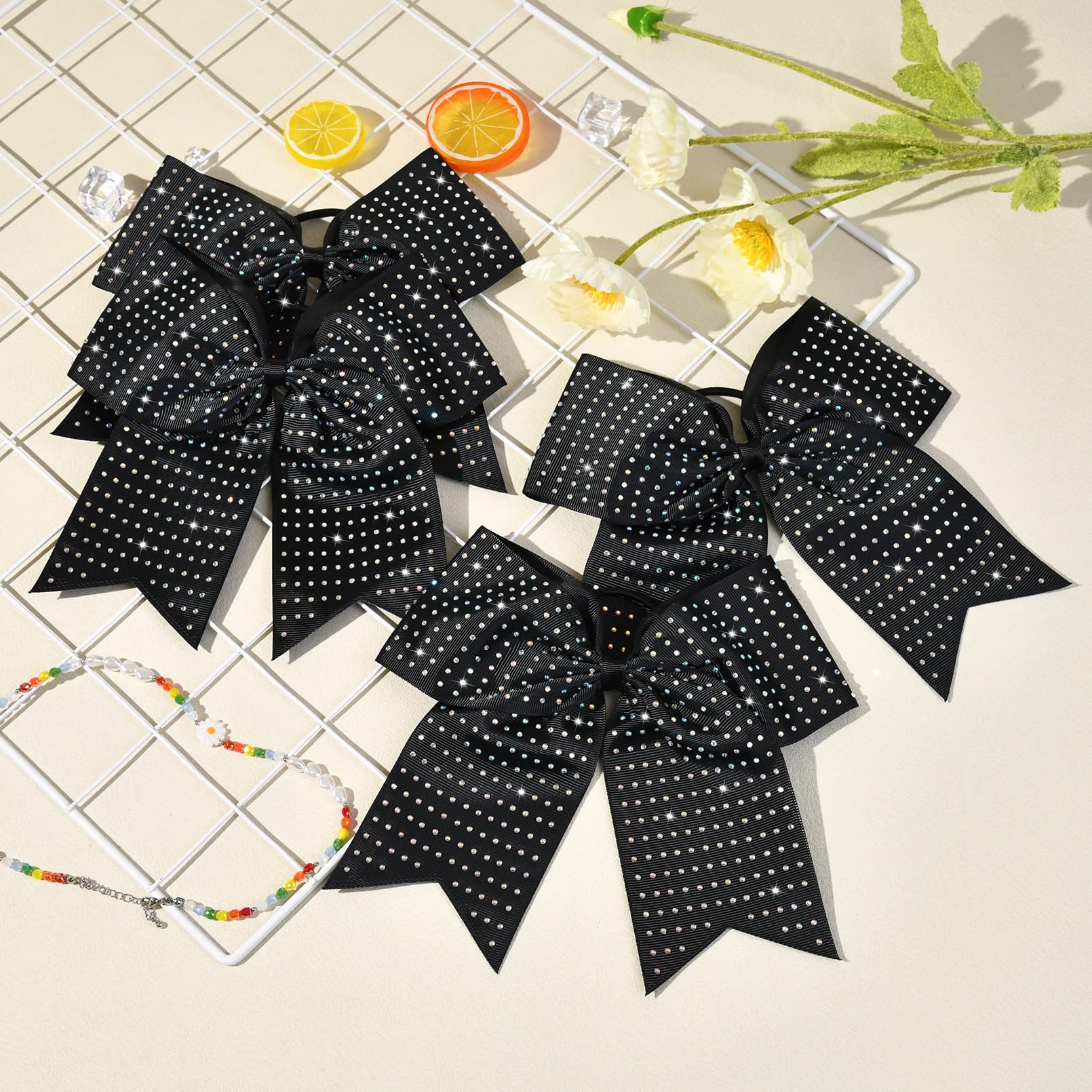 CEELGON 12-piece black glitter cheer bows elastic pony attachment for secure wear during practice.