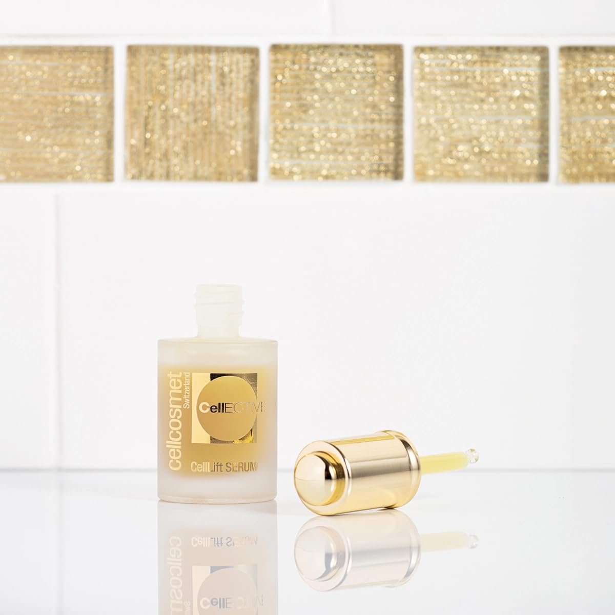 Application on the face during routine with CellLift Serum for hydration.