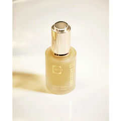 Texture close-up of CellLift Serum showing smoothing effect on skin.
