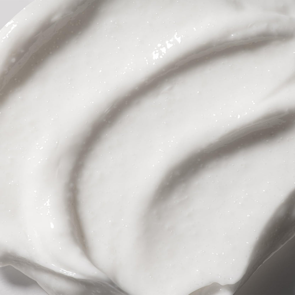 Cellcosmet Exfoliant Dual Action texture closeup highlighting smooth, brighter skin potential.