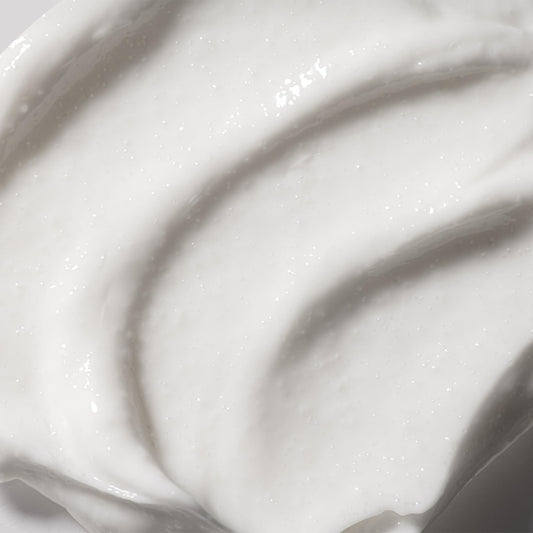 Cellcosmet Exfoliant Dual Action texture closeup highlighting smooth, brighter skin potential.