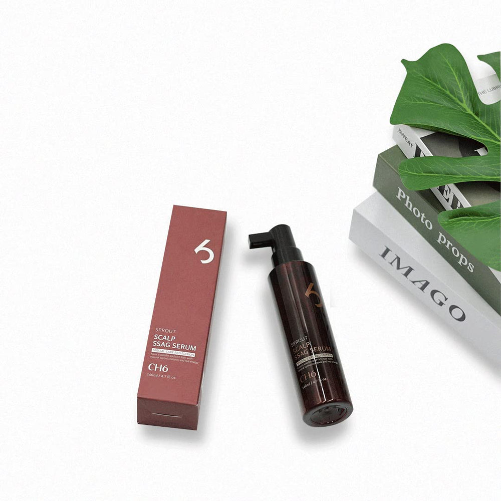 Applying CH6 Scalp Ssag Serum Red Edition to the scalp for targeted care