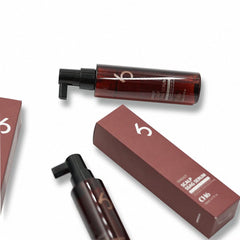 Close-up of CH6 serum dispensing pump for easy scalp application