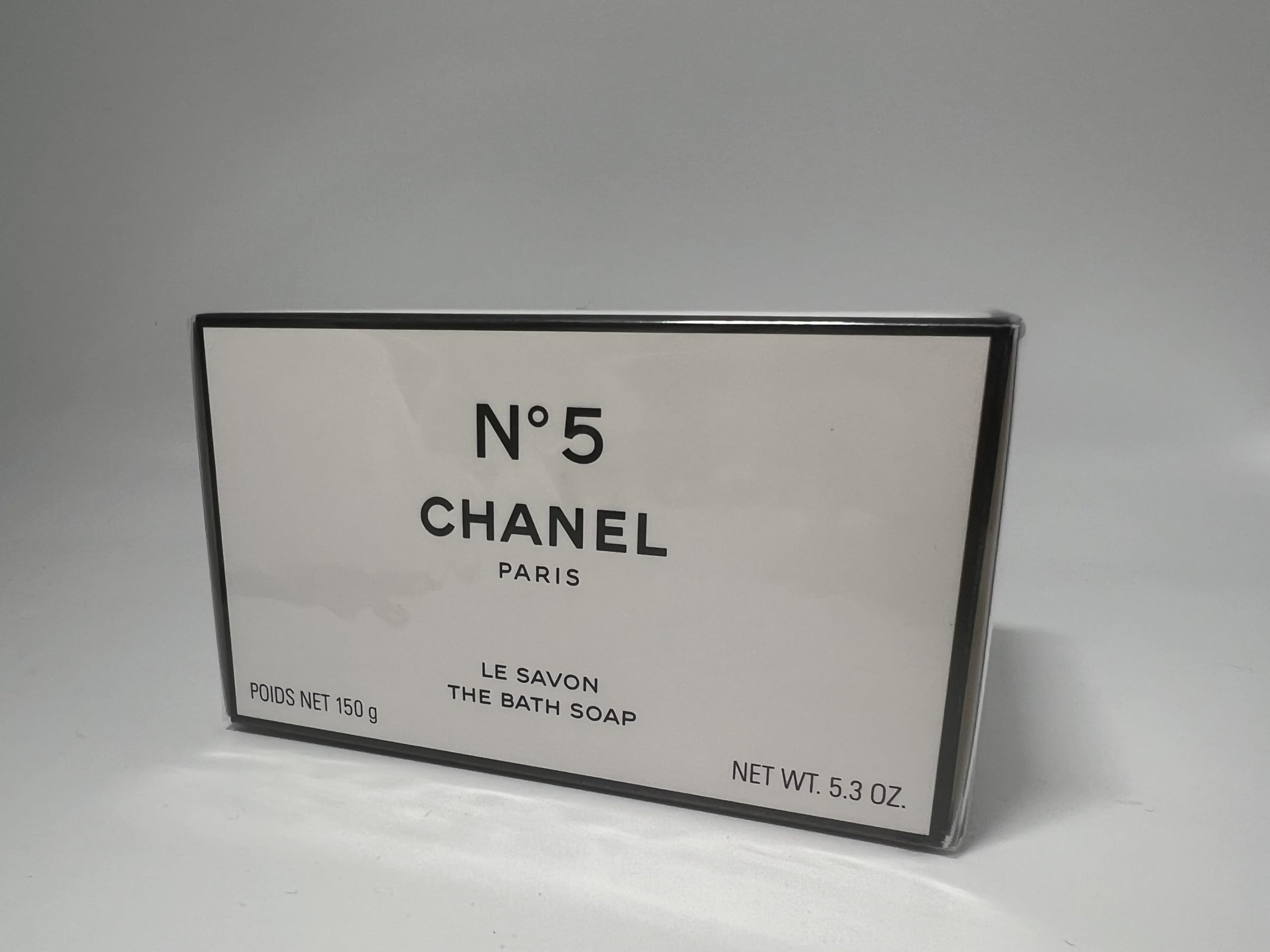 Chanel No 5 bath soap close-up shows smooth bar with refined texture.