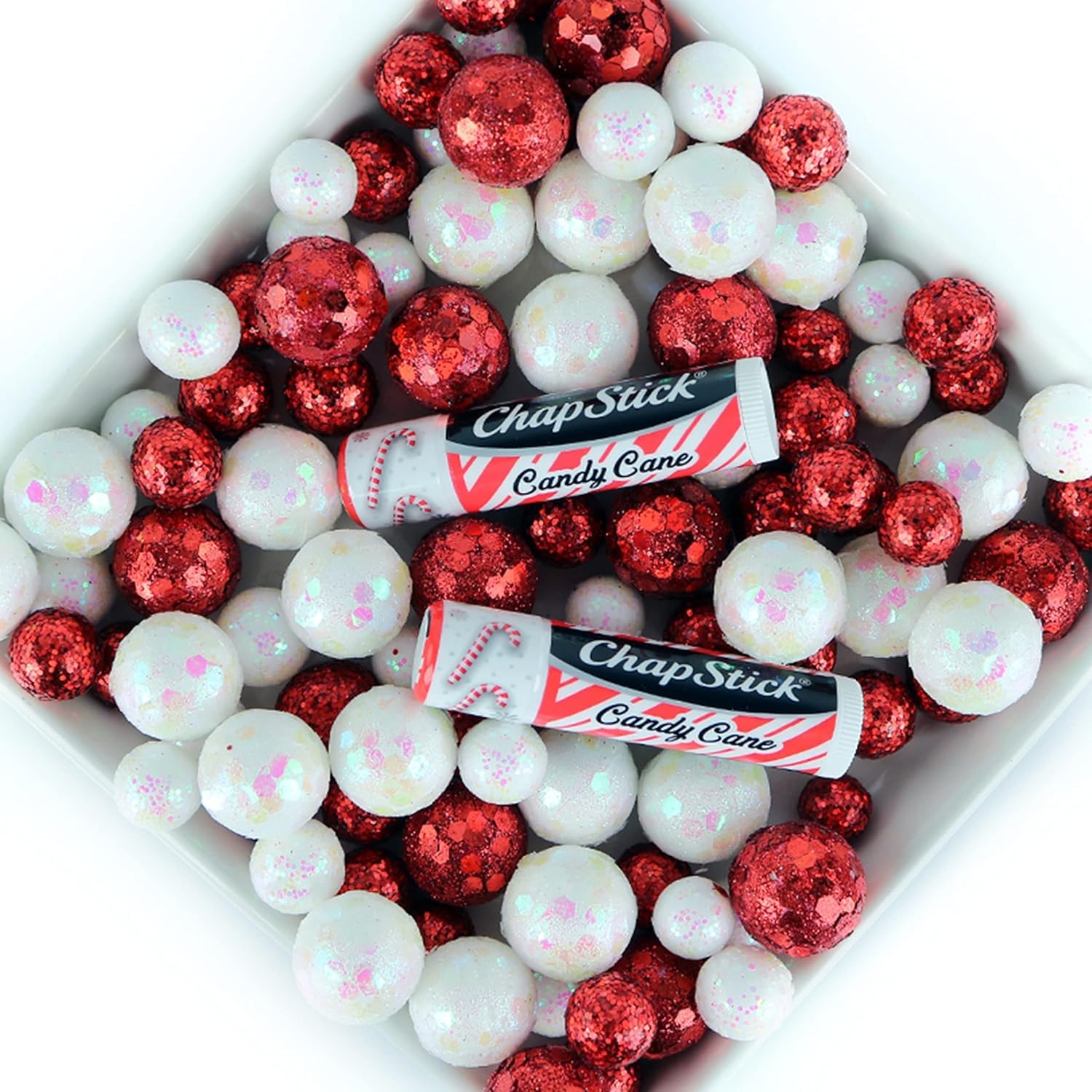ChapStick Candy Cane applying lip balm with mint scent.