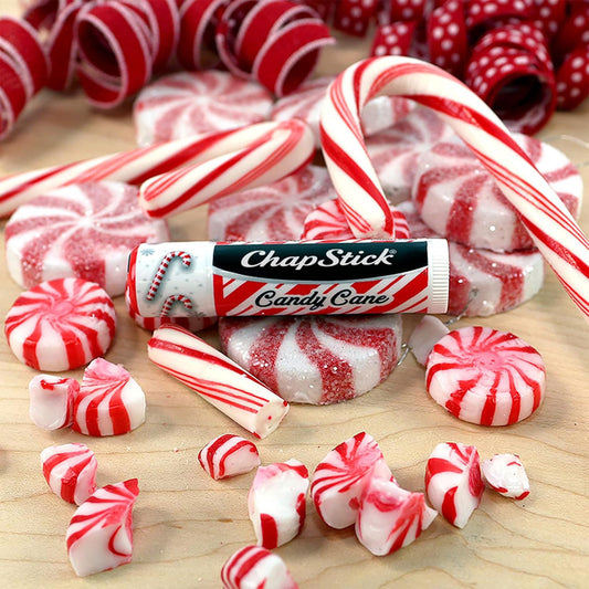 Candy Cane ChapStick tube with mint scent for daily lip moisture.