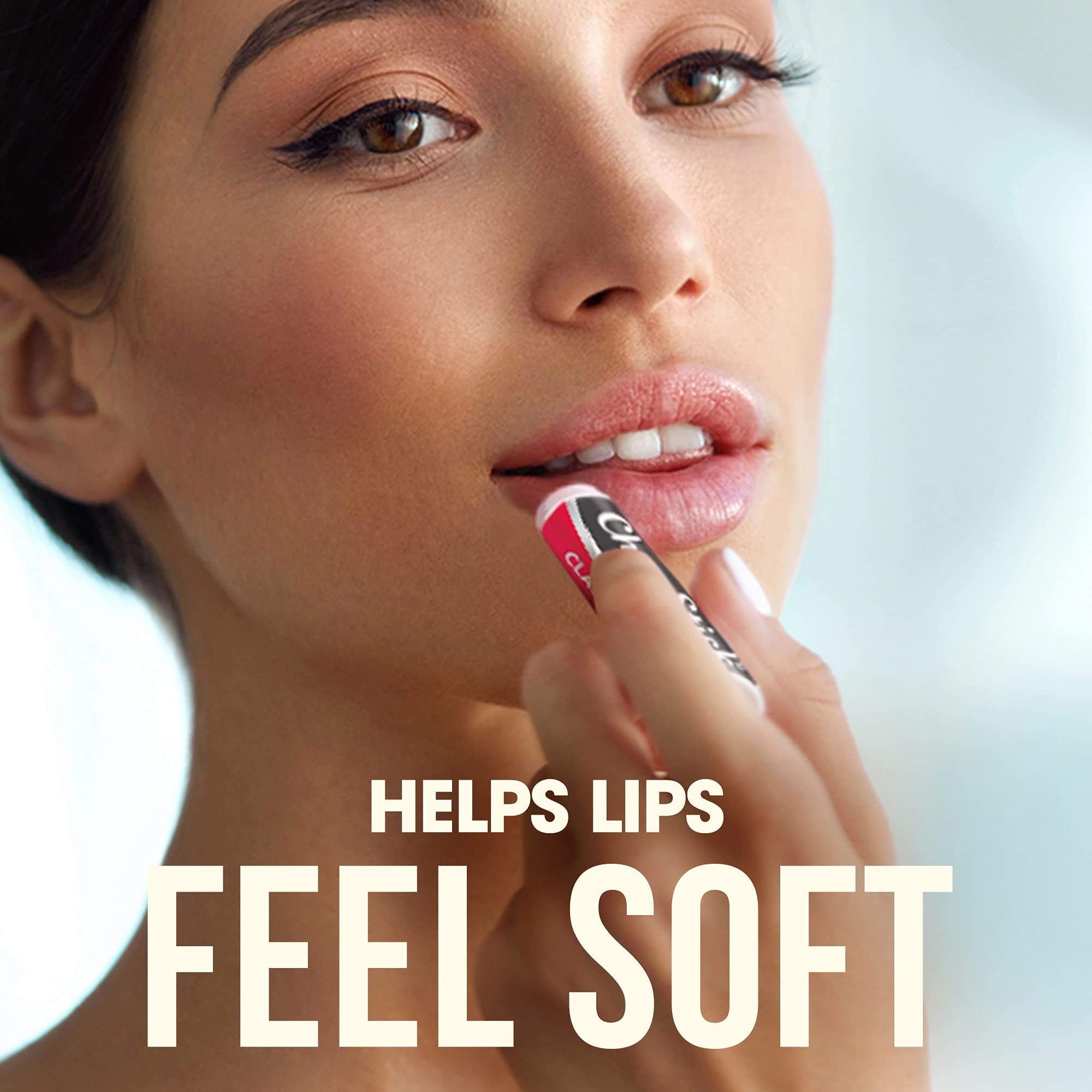 ChapStick Classic Cherry tube in hand for on-the-go lip care.