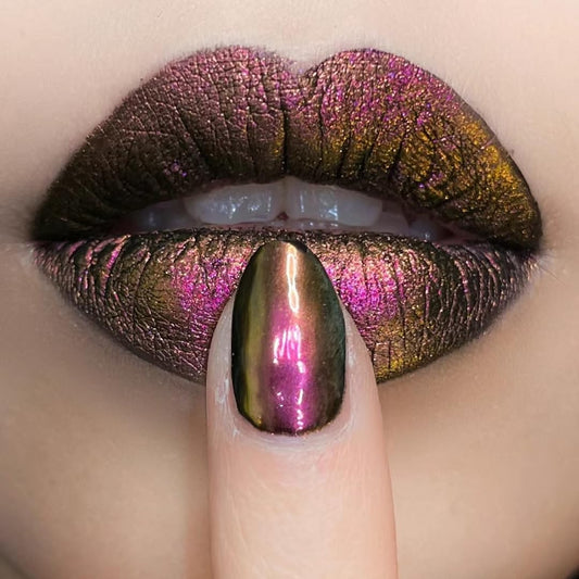 CHARMING MAY Chrome pigment on a nail swatch reveals shifting color under light.