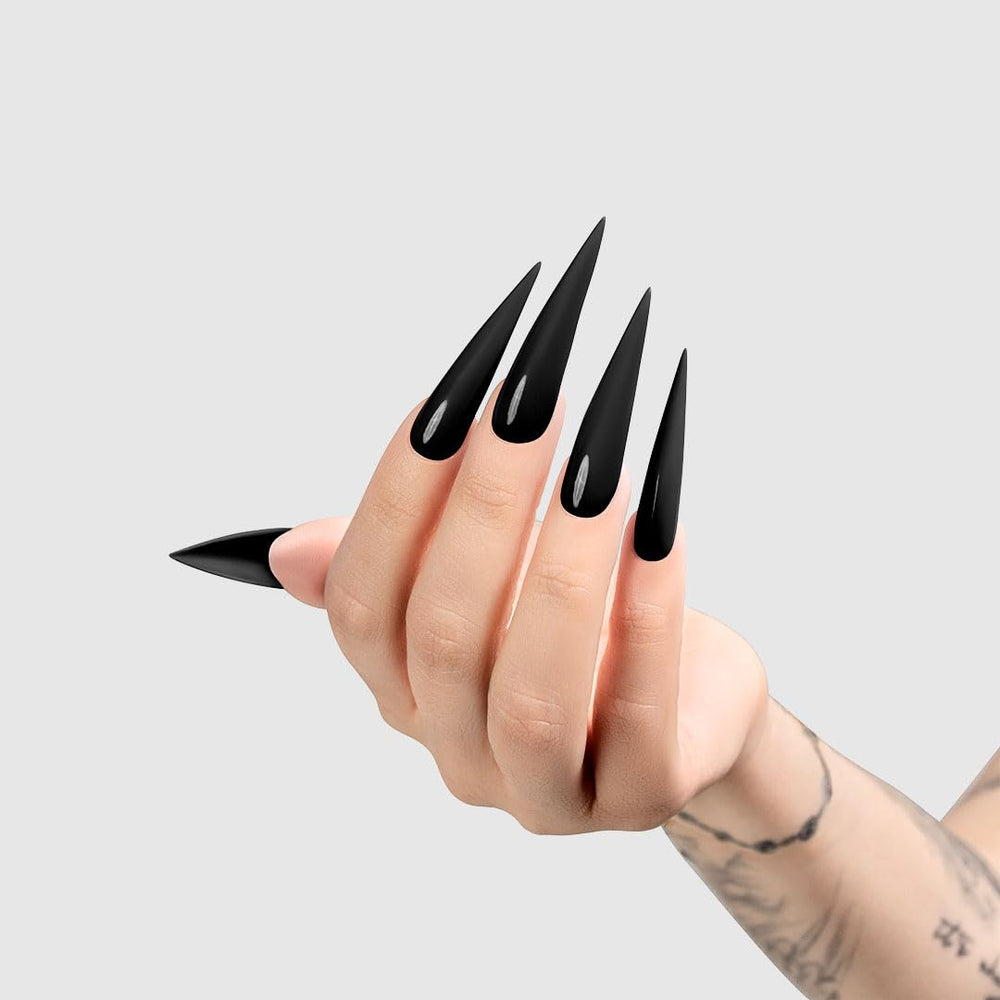 Chaun Legend gel polish brush applying smooth, even color for flawless coverage.