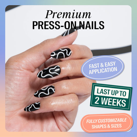 Chillhouse Creepy Baby Almond Tips on nails for Halloween-inspired style.
