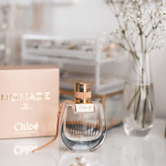 Chloe Nomade Mini bottle with neutral tones reflects everyday wearability.