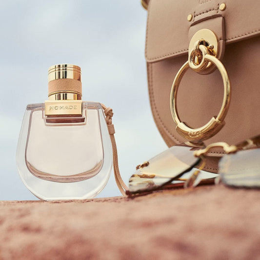 Chloe Nomade Mini packaging close-up highlighting compact travel design.