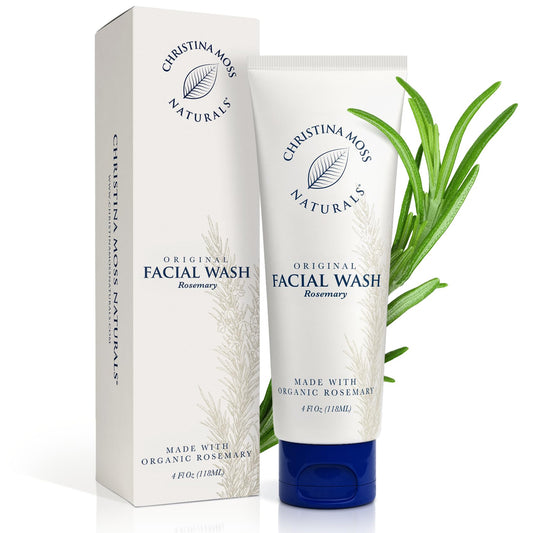 Christina Moss Naturals face wash bottle being poured for gentle cleansing.