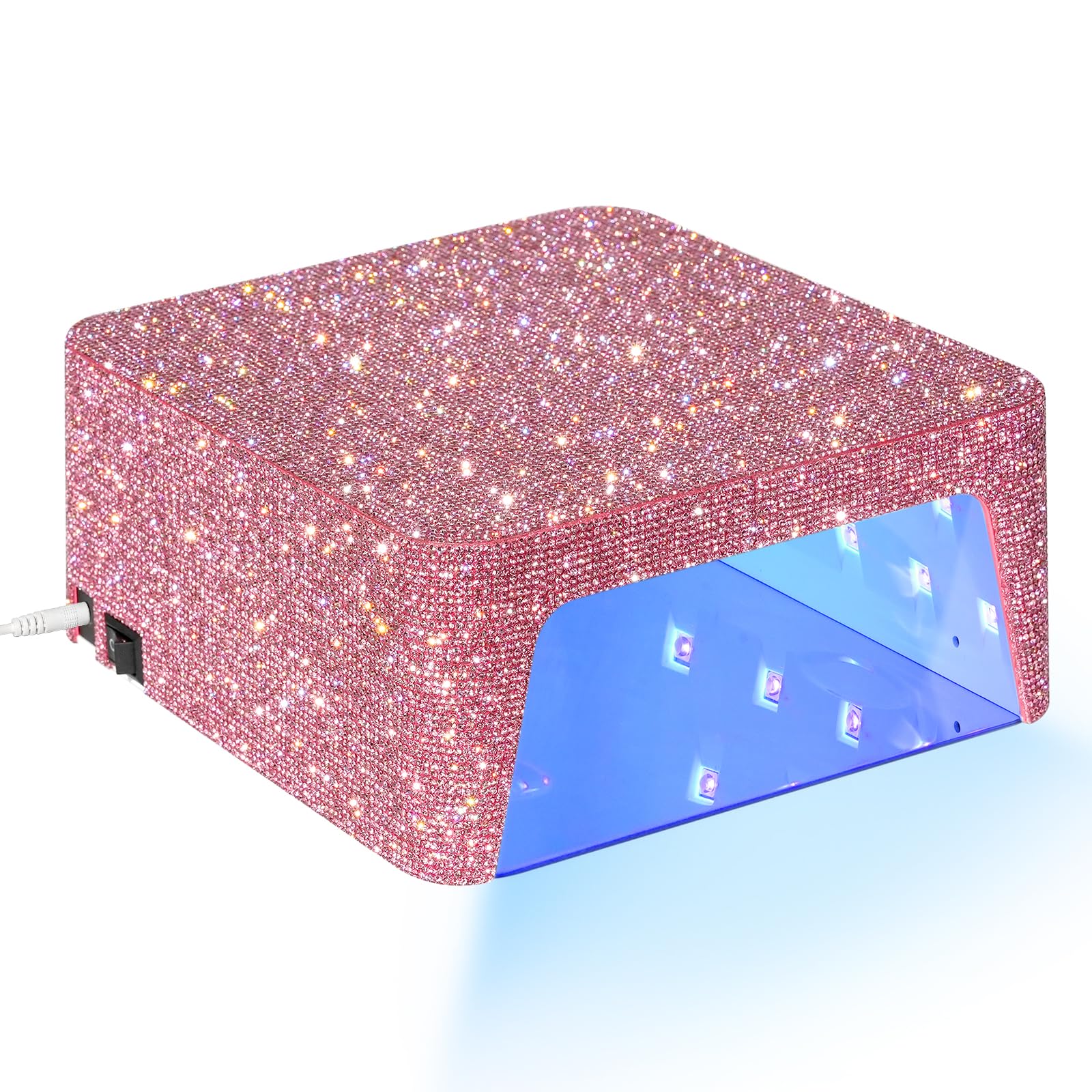 CHRISTINE SHELLY UV nail lamp elegant sparkling design in a home salon.