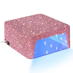CHRISTINE SHELLY UV nail lamp elegant sparkling design in a home salon.