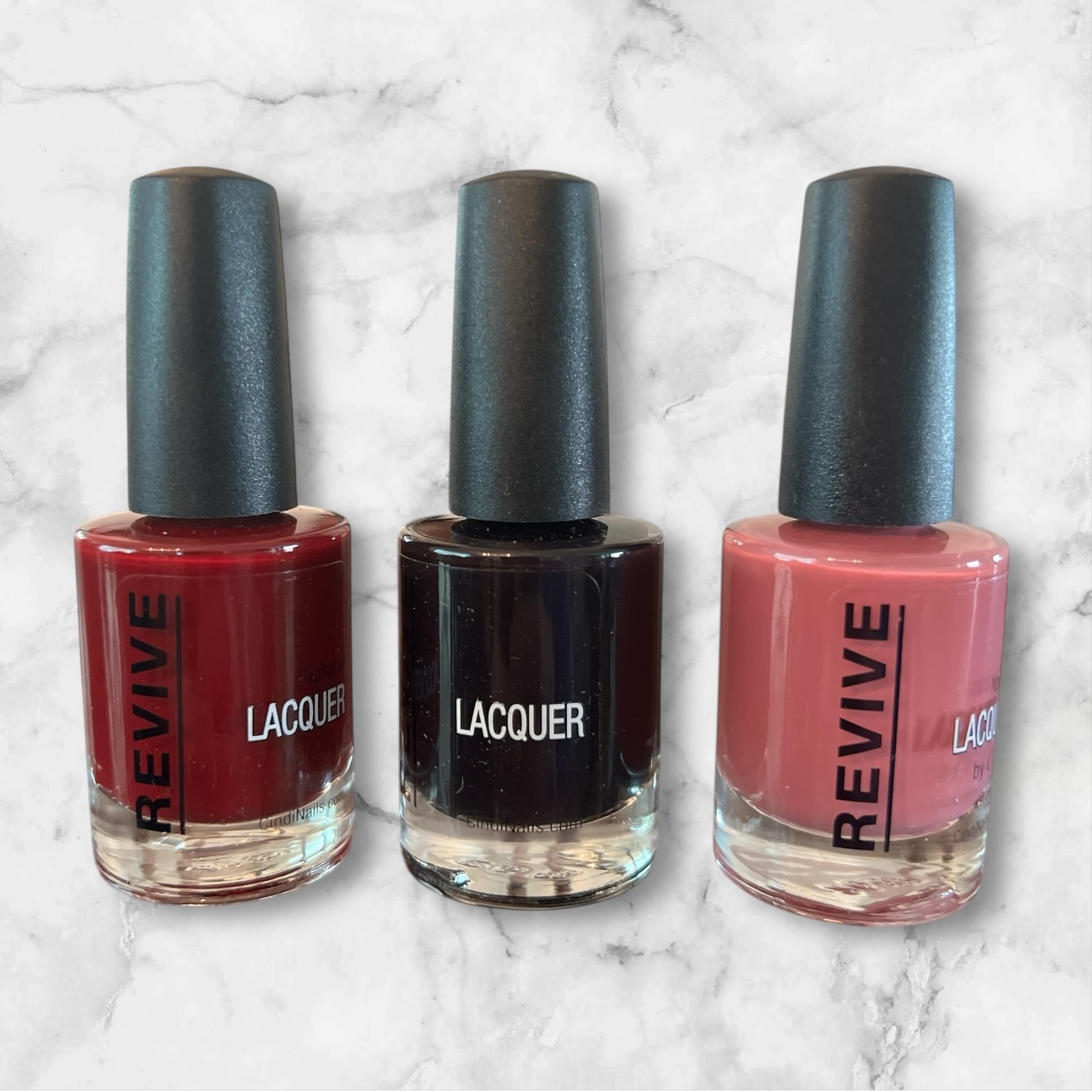 Cindi Nails Dark and Moody trio packaging highlights long-lasting color and safety.