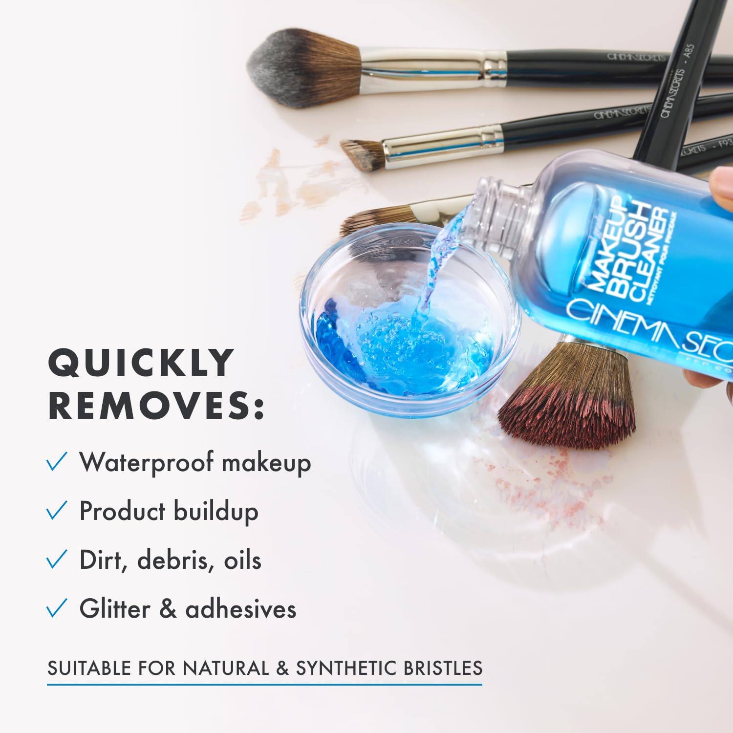 Clean brushes drying on a towel after Cinema Secrets rinse-free treatment.