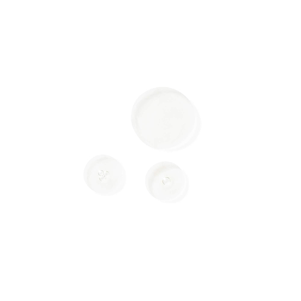City Beauty Ultra-Firming Dry Oil bottle with soft glow
