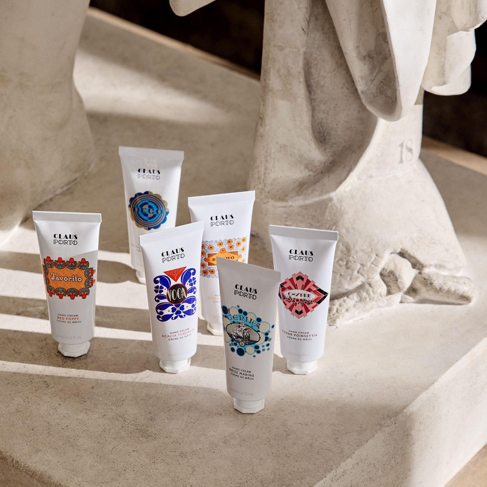 Close-up of Claus Porto Favorito Red Poppy Hand Cream showing smooth, nourished hands after use.