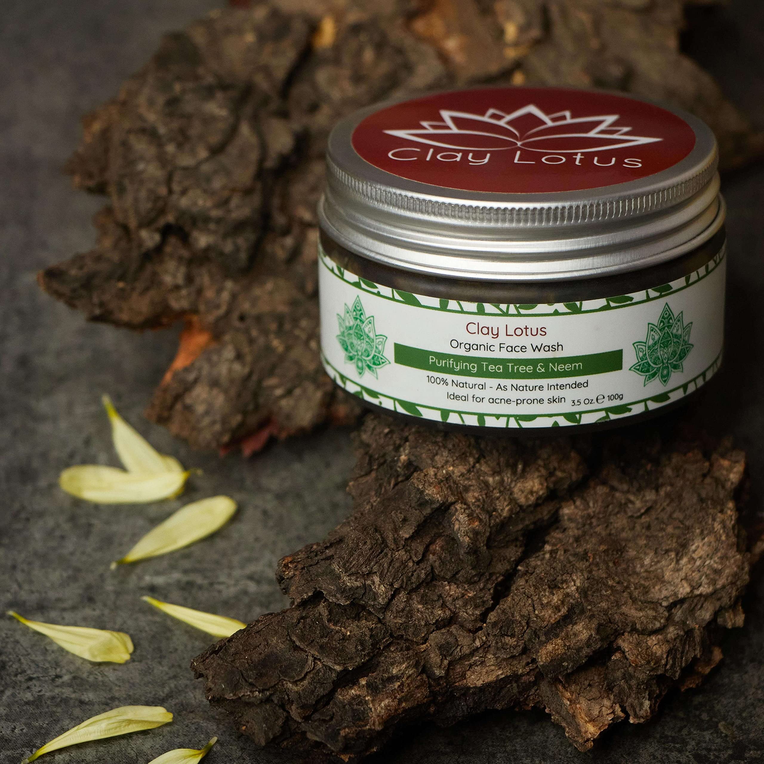 Clay Lotus bottle close-up shows antioxidants and vitamins powering skin nourishment