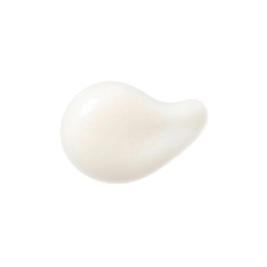 Texture close-up of Clé de Peau Beauté Concentrated Brightening Serum refill showing quick-absorbing formula.