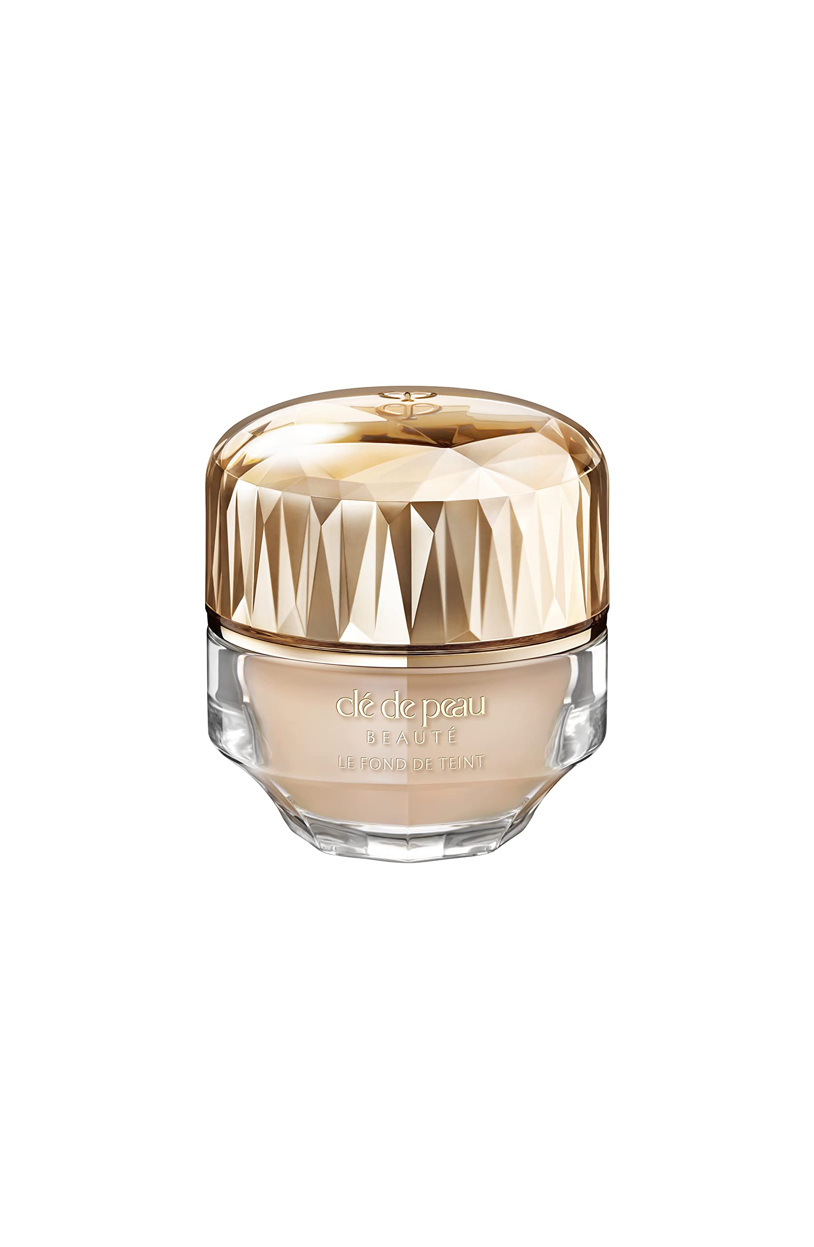 Clé de Peau Beauté foundation bottle shows SPF 22 and luxe texture for a radiant finish
