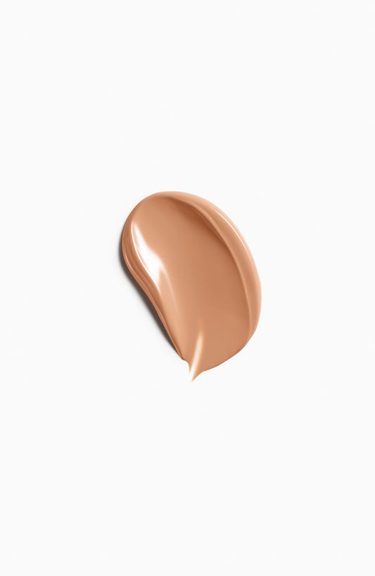 Clé de Peau Beauté Foundation swatch shows a neutral light tan undertone.
