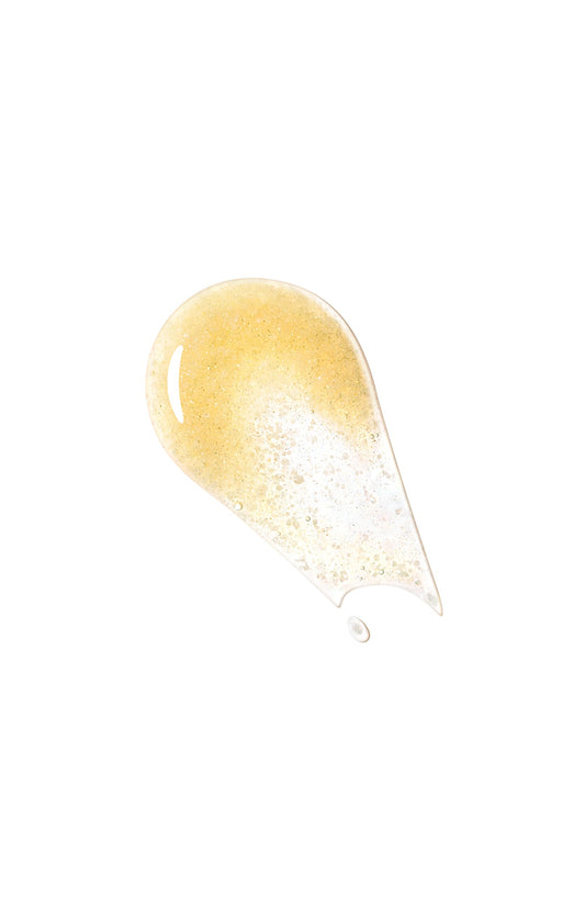 Close-up of Precious Gold Vitality Serum cap signaling luxury packaging.