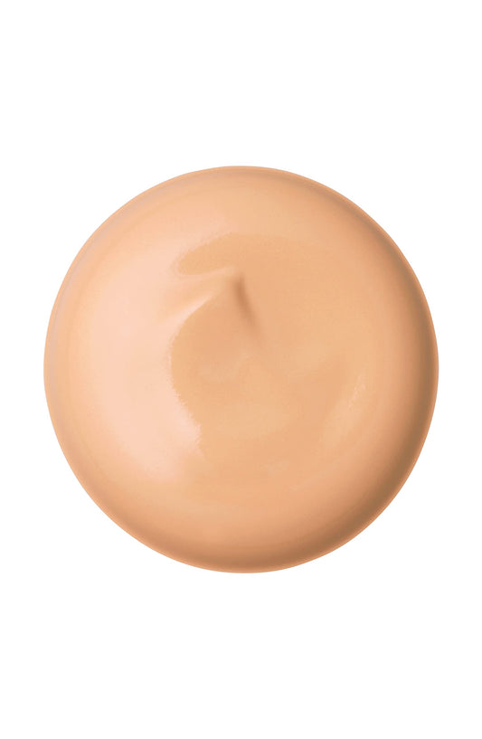 Close-up of Radiant Cream Foundation texture showing creamy, blendable consistency
