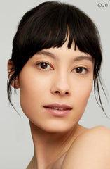Cle de Peau Radiant Fluid Foundation O20 applied look on skin shows glow.