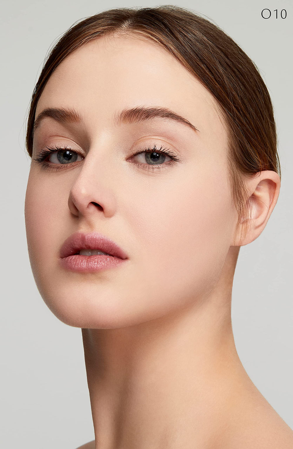 Cle de Peau Beaute Radiant Fluid Foundation soft glow finish on skin.