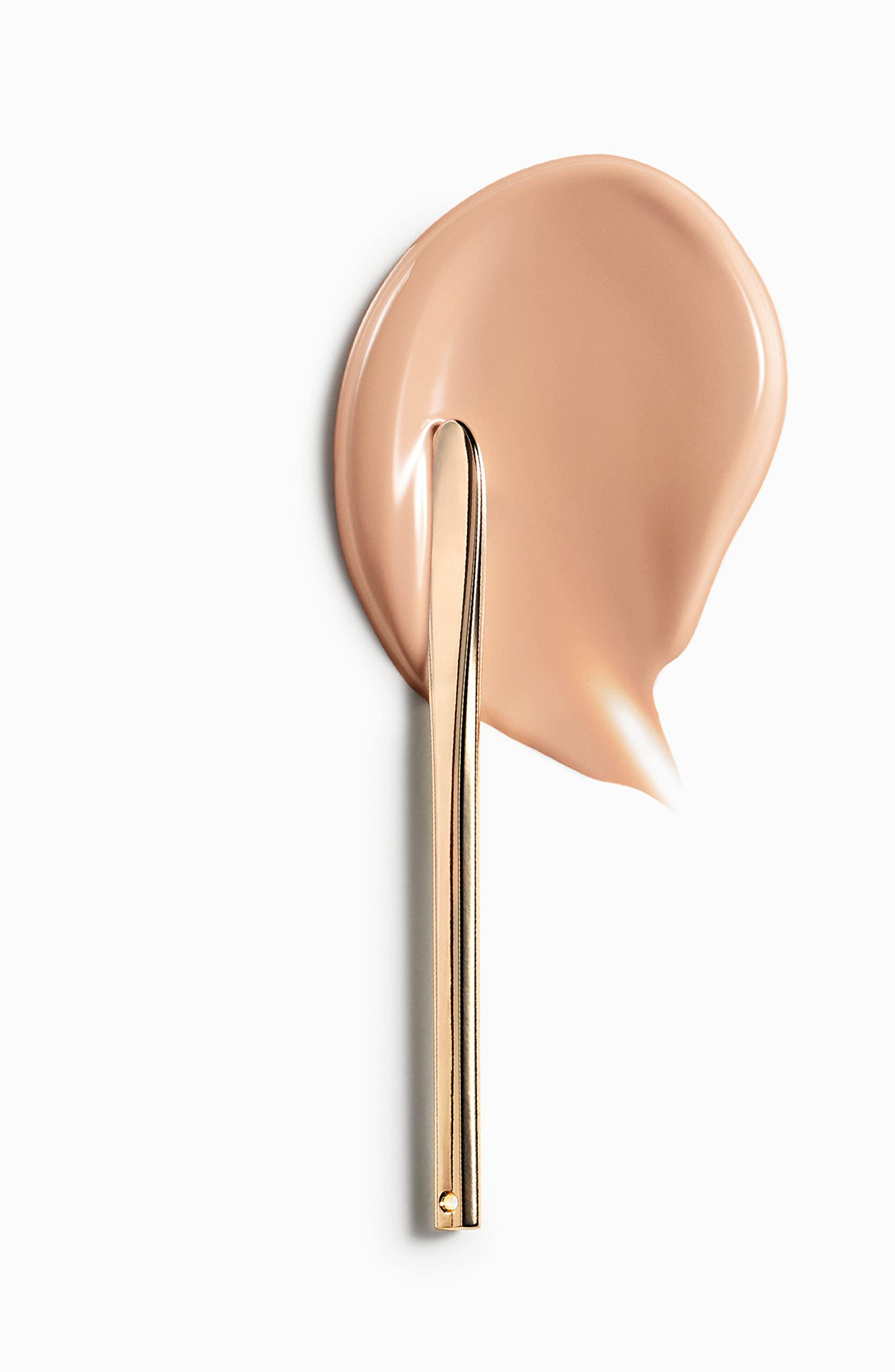 Foundation on skin reveals a natural, radiant finish with light coverage.