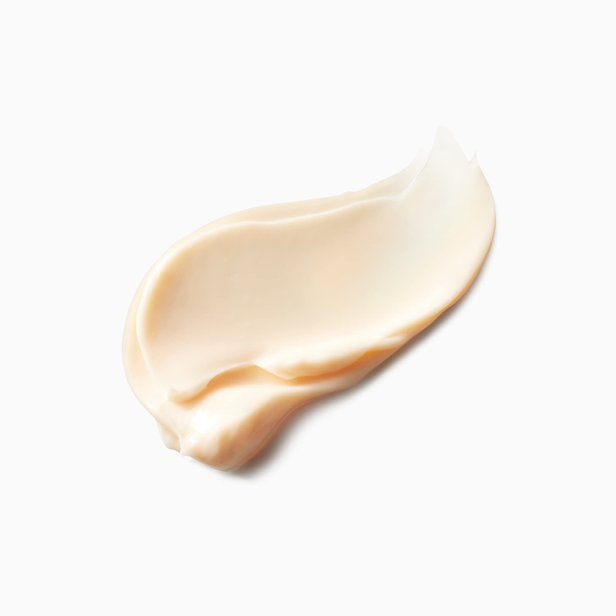 Clé de Peau Beauté mini volumizing cream supreme on-skin shows even texture and subtle glow.