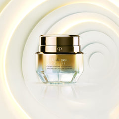 Clé de Peau Beauté mini volumizing cream supreme packaging demonstrates compact, travel-friendly size.