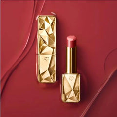 Swatch on skin reveals rich color of Cle de Peau Shade 1.