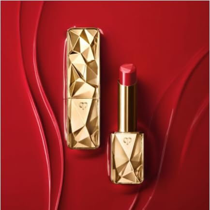 Clé de Peau Beauté The Precious Lipstick Shade 2 on lips delivers versatile color with a satin finish.