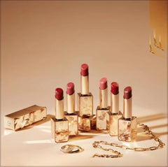 Clé de Peau The Precious Lipstick Shade 6 case detail reflects luxury packaging and brand clarity.
