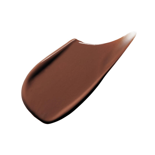 Clé de Peau Radiant Corrector Eyes Espresso applicator close-up for precise coverage