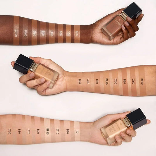 Texture close-up showing lightweight, silky formula on skin.