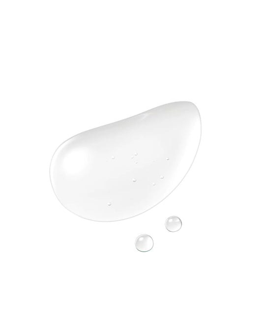Clé de Peau The Serum Refill bottle cap close-up highlighting refined design