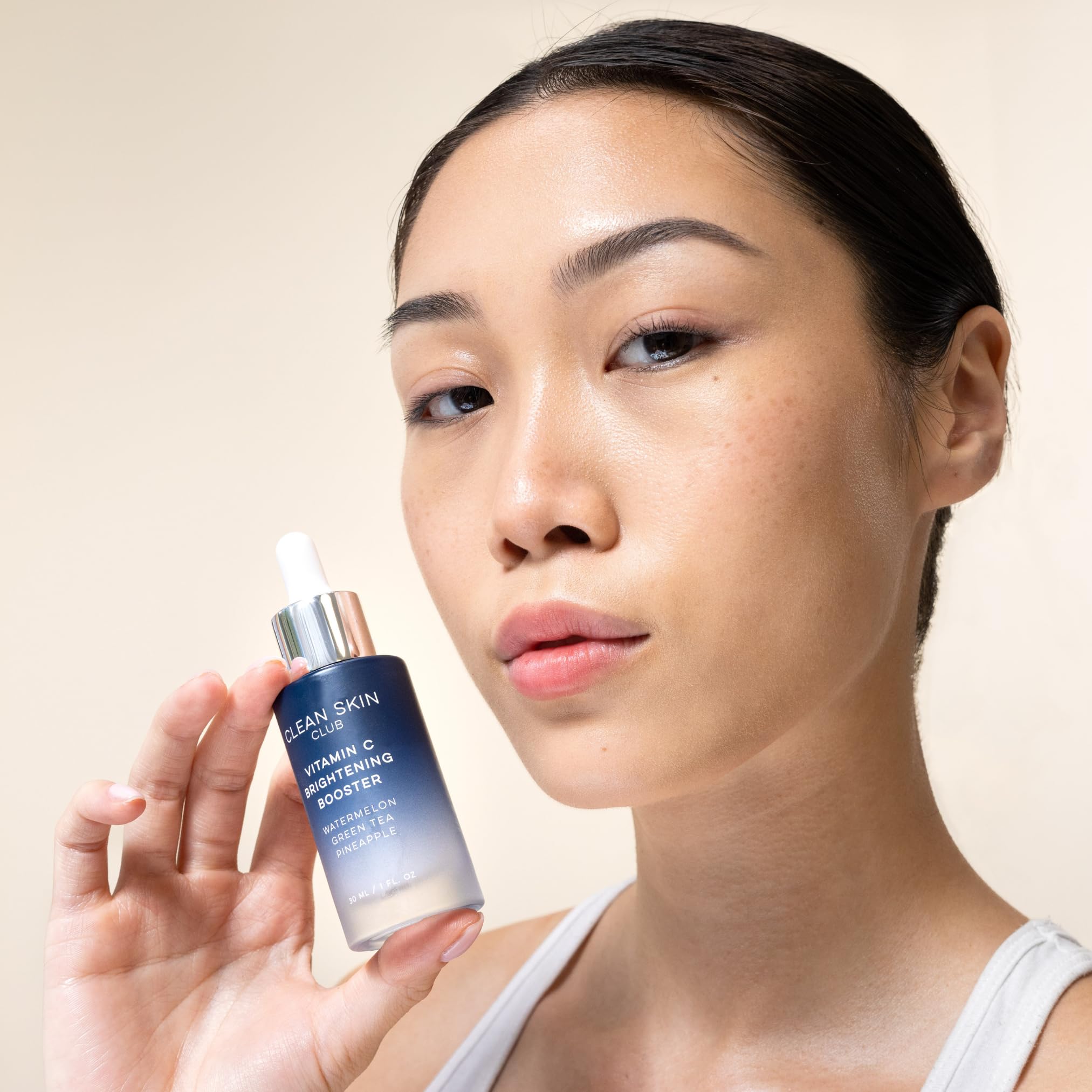CLEAN SKIN CLUB after-application glow highlighting radiance.