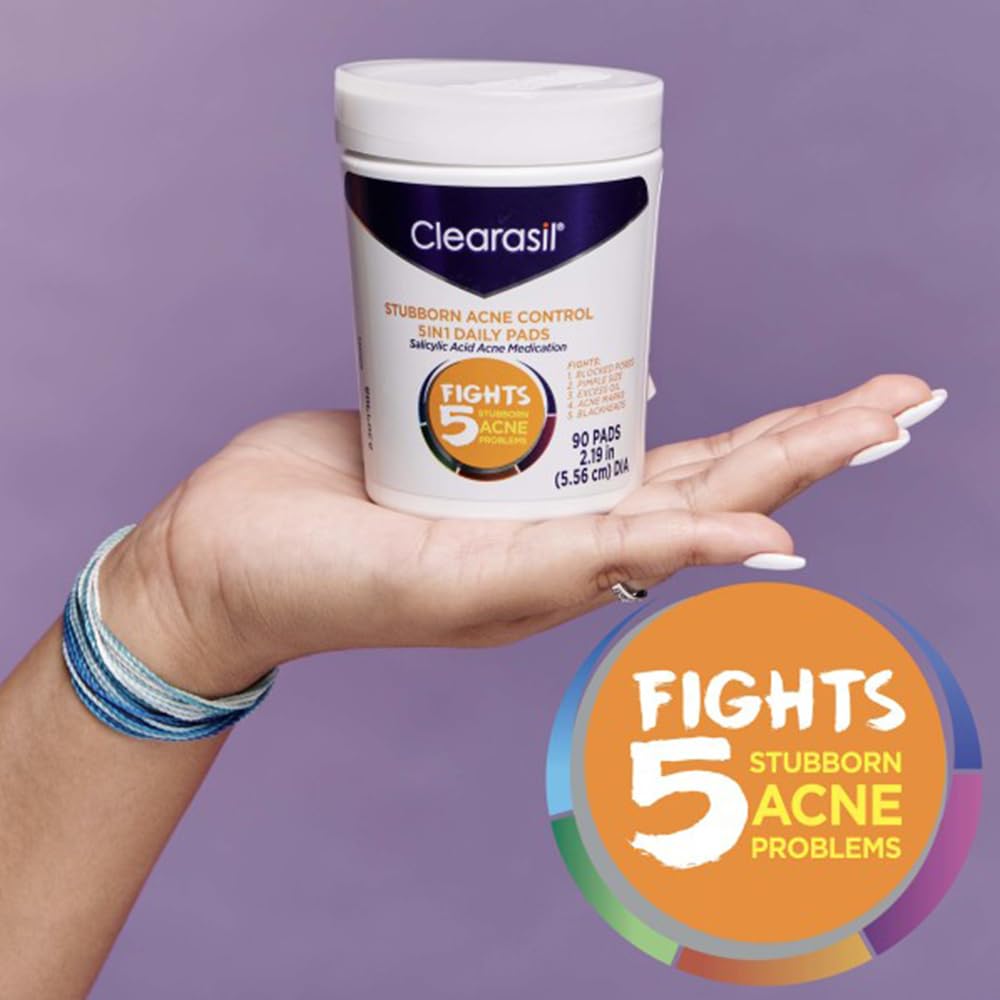 Clearasil packaging on bathroom shelf with clean, minimal presentation.