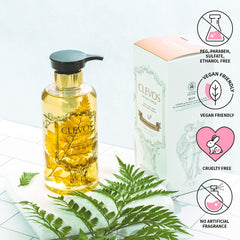 Clevos Natura Foresta bottle beside leaves evokes pleasant Rumohra scent
