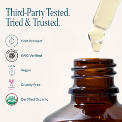 Cliganic hemp seed oil texture closeup highlights golden hue and natural unrefined quality.