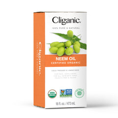 Cliganic Neem Oil in plant care setup, suitable for leaves and soil care.