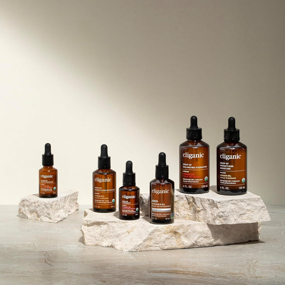 Cliganic Organic Pumpkin Seed Oil applied to skin, suitable for face and hair care.