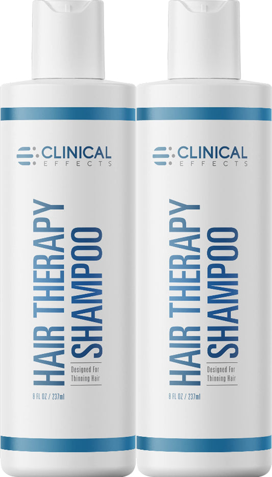Clinical Effects Hair Therapy Shampoo bottle close-up showing premium biotin formula for fuller hair.