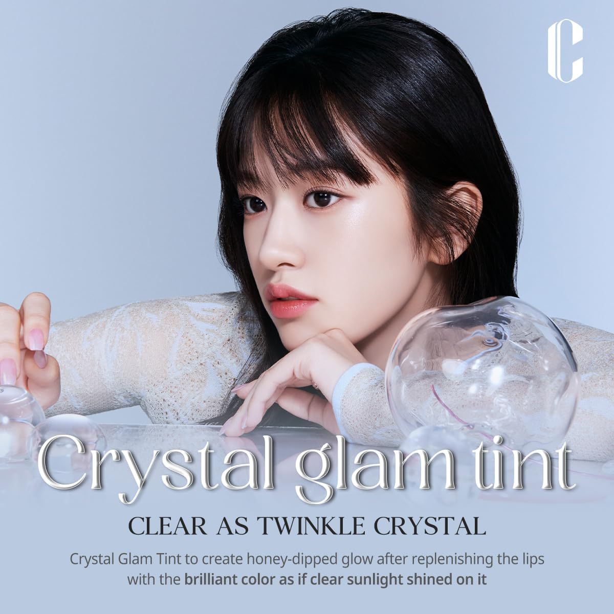 CLIO Professional Crystal Glam Tint applicator demonstrates smooth glide for lips