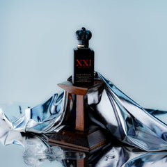 Clive Christian XXl Noble Blonde Amber crown-cap bottle highlights heritage and sophistication.