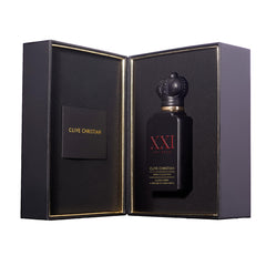 Clive Christian XXl Noble Blonde Amber crystal bottle showcases premium perfume elegance.